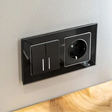 картинка Выключатель двухклавишный с подсветкой черный матовый WL 08-SW-2G LED W1120108 Werkel 029878 051619  являющийся официальным дистрибьютором в России 