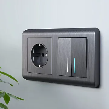 картинка Розетка с заземлением графит рифленный Werkel W1171004 050761  являющийся официальным дистрибьютором в России 